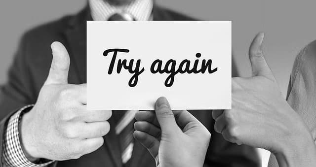 Sign with the words "try again", symbolising iteration and experimentation